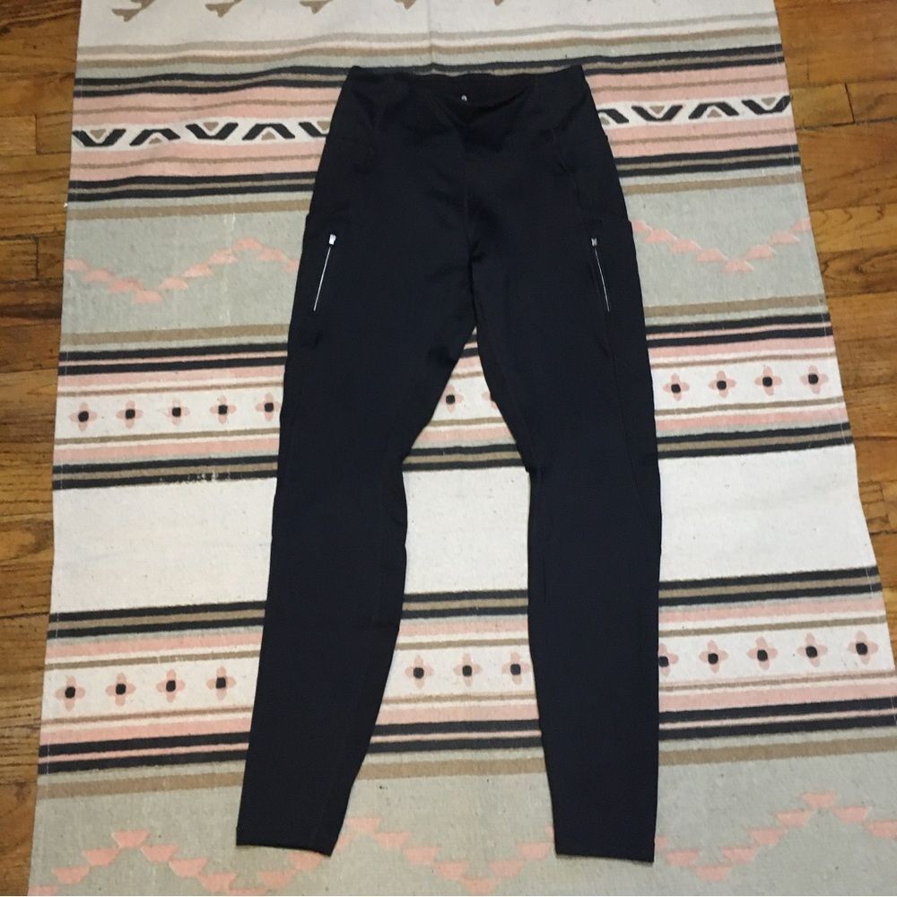 Athleta Small Black leggings with zipper pockets 11” rise - 35” length sporty